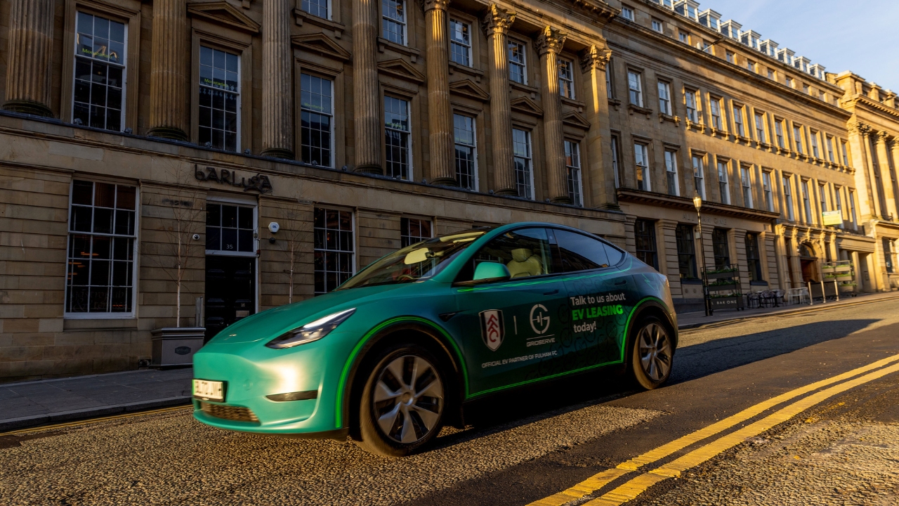 Tesla Model Y driving through Grey Street in Newcastle